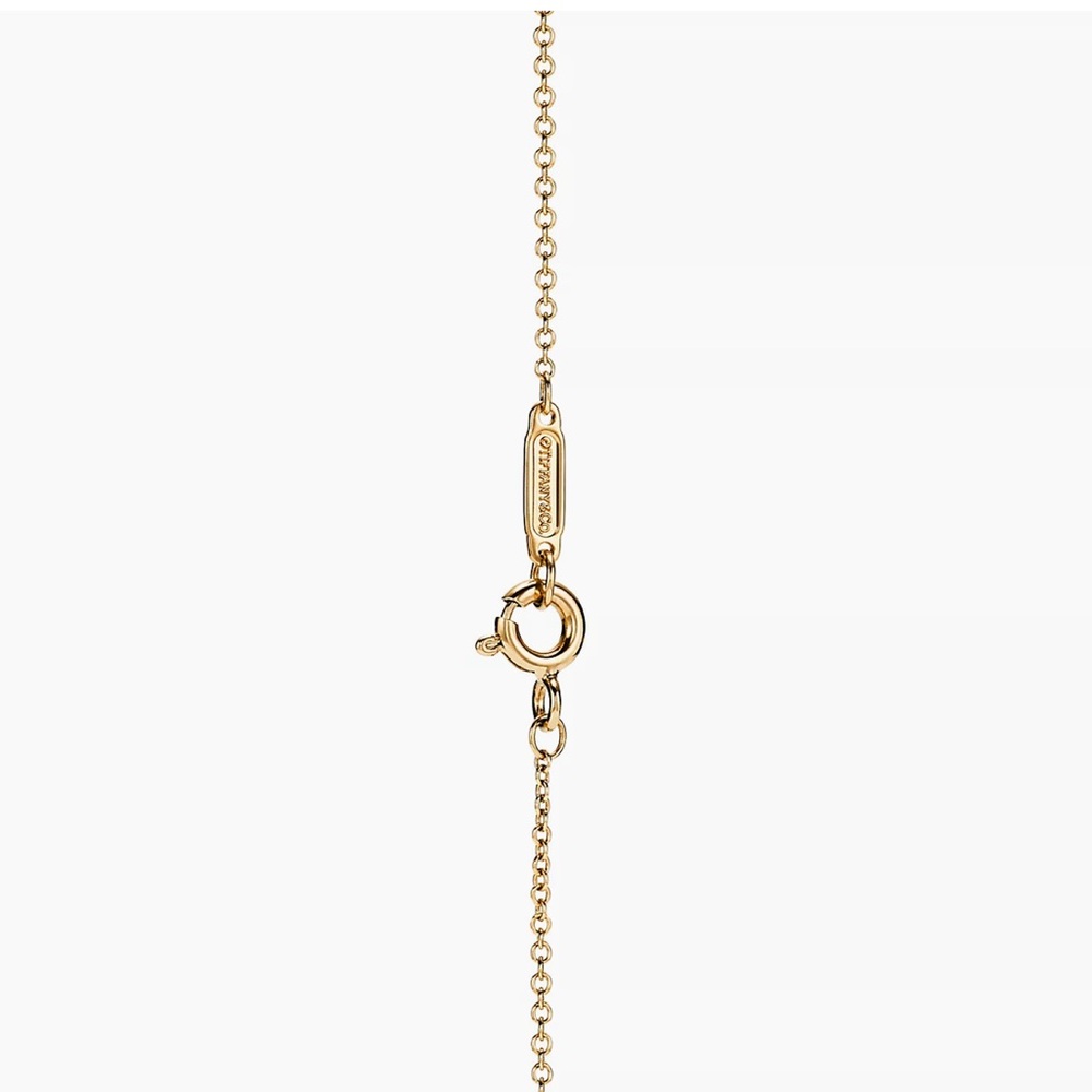 Tiffany & Co. Gold and Blue Mini Heart Pendant Necklace - Picture 6 of 17